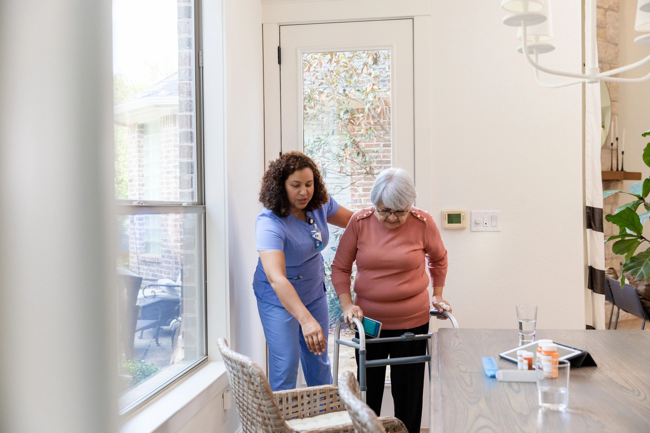 CareWorks caregiver sharing a warm personal moment with senior client at home