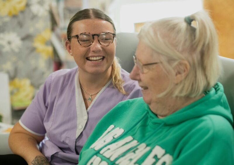 Caregiver providing companionship and support at home