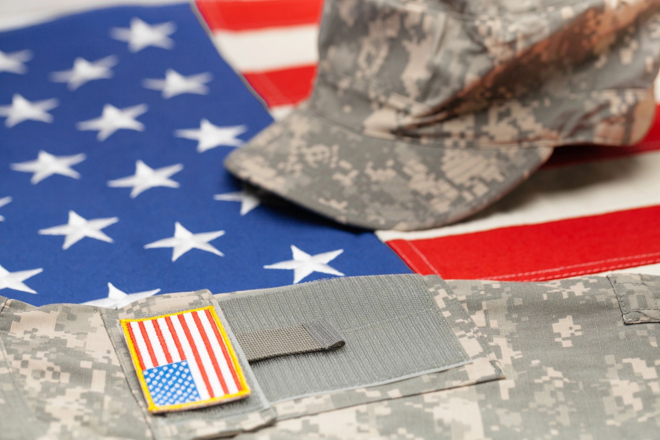 U.S. military uniform and American flag representing Veterans Care